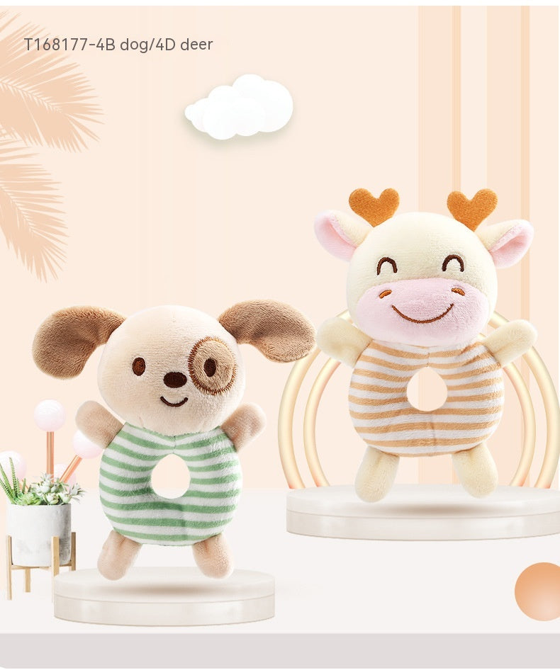 Two plush toys on display: one dog with floppy ears and green stripes, and a smiling deer with antlers and orange stripes. Both are ring-shaped and set against a soft pastel background.