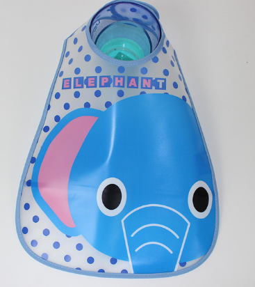 Blue bib with an elephant design featuring large eyes and ears, surrounded by polka dots and the word "ELEPHANT" on top. A small cup is attached at the neck.