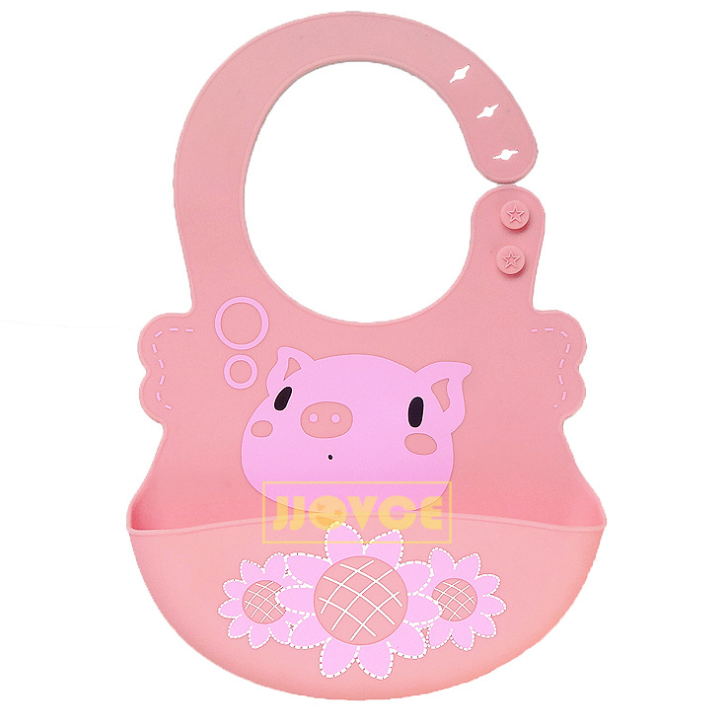 Pink silicone bib with a pig face, bubble designs, and floral patterns. It features a rounded neck strap with star buttons for fastening.