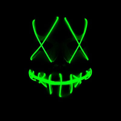 A glowing green LED mask in the dark, featuring X marks over the eyes and a stitched smile design, creating an eerie and mysterious appearance.