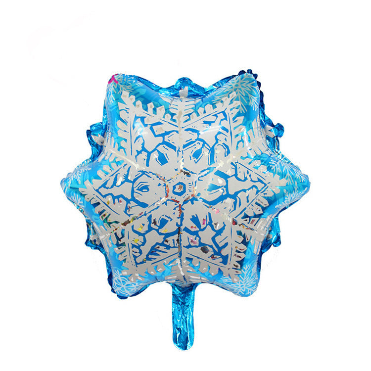 Bright blue star-shaped balloon with intricate white snowflake patterns. It has a shiny surface and is set against a plain white background.
