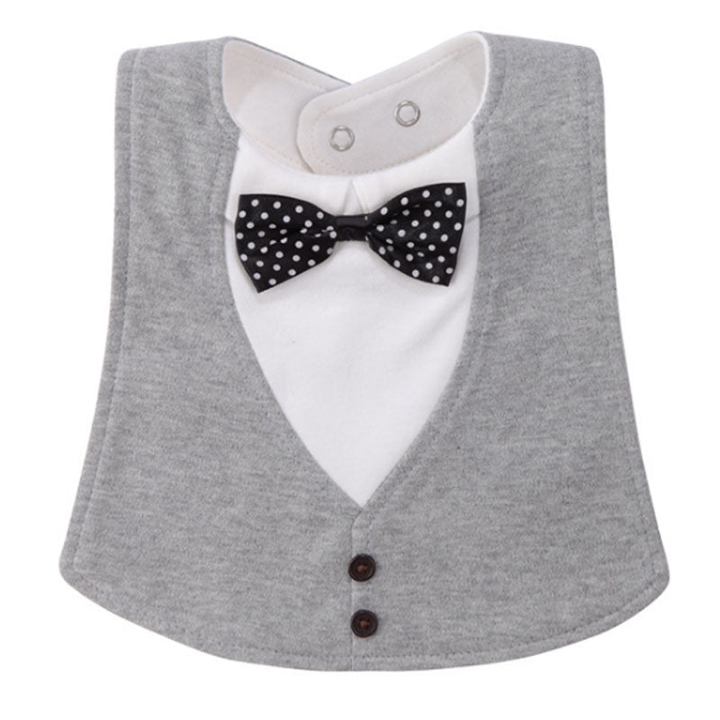 Gray baby bib designed like a tuxedo, featuring black buttons and a polka-dotted bow tie. The neckline is white with snap closures for easy fastening.