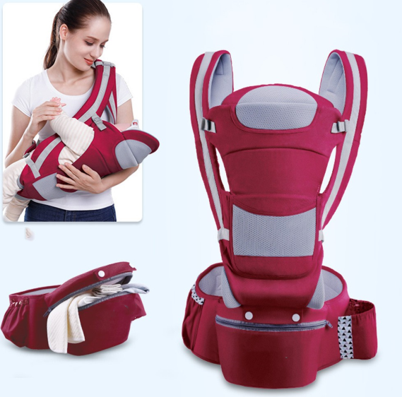 Maroon baby carrier with adjustable straps and mesh panels. Close-up on woman holding baby in carrier, and carrier's detachable pouch on white background.