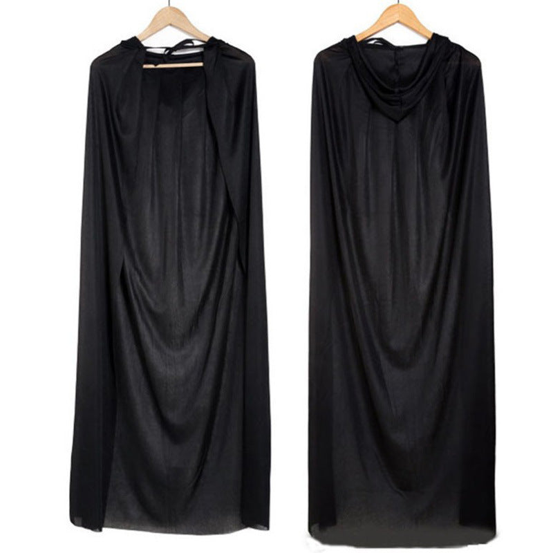 Two black cloaks hang on wooden hangers. The cloak on the left displays an open front, revealing a simple tie closure at the neckline, while the cloak on the right is shown from the back, highlighting the draped hood. Both cloaks have a smooth, flowing fabric and reach down to the floor.
