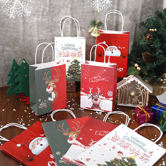Christmas gift bags with festive designs, including a reindeer and snowman. Accompanied by a small wooden house decoration, green tree cutouts, and colorful wrapped presents.