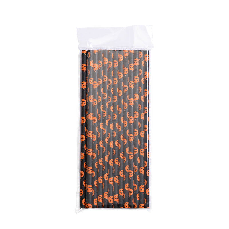 Pack of black paper straws featuring orange pumpkin designs, neatly arranged in a clear plastic sleeve. Perfect for adding a festive touch to Halloween parties.