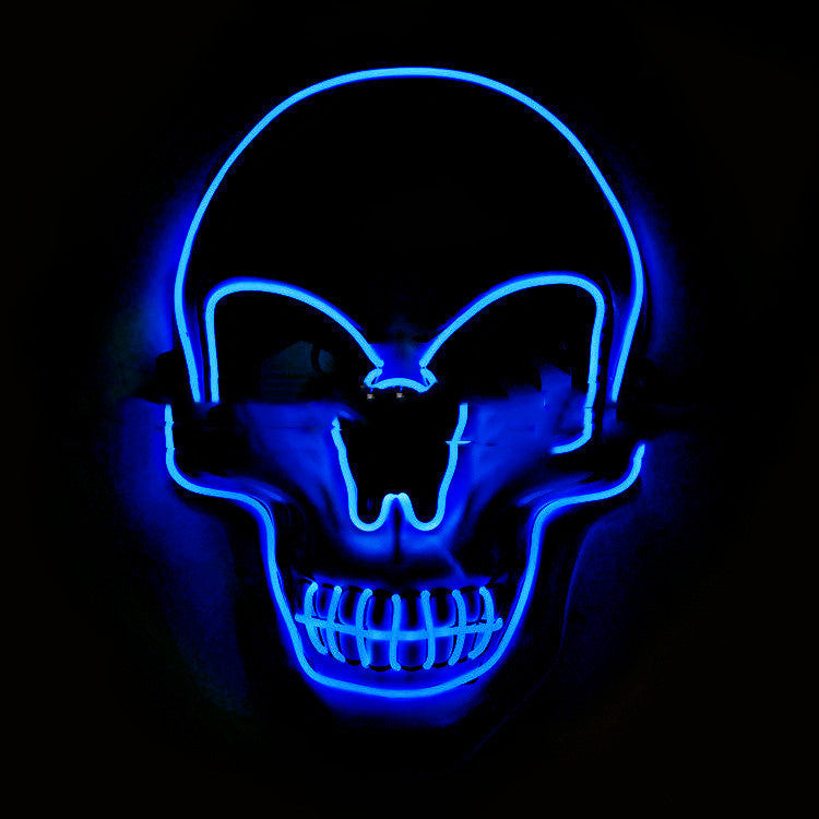 Blue neon lights form the outline of a skull against a black background, with prominent cheekbones and a wide grin, creating an eerie, glowing effect.