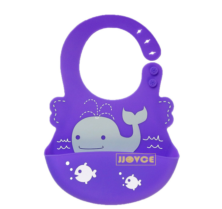Purple silicone bib with a smiling gray whale and fish design. Features adjustable neck strap with two buttons.