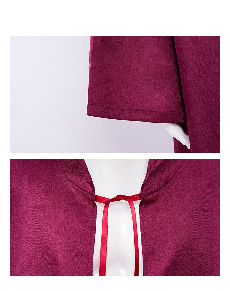 Close-up of a maroon garment with sleeve and collar details. The sleeve has a white inner lining, and the collar is tied with a red ribbon, showcased on a white mannequin.