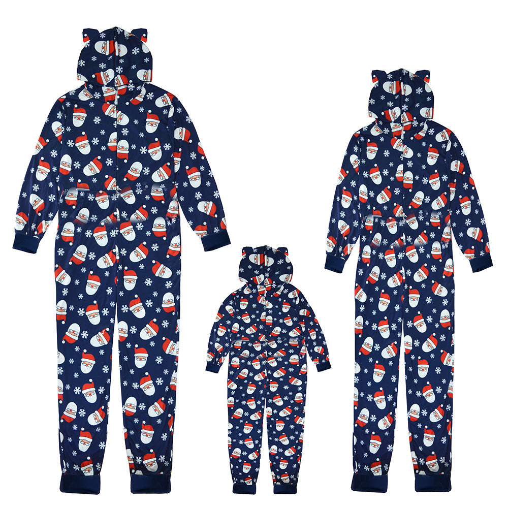 Three blue hooded onesies with bear ears feature a Santa and snowflake pattern, two adult-sized and one child-sized, displayed against a white background.