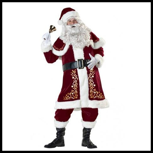 Santa Claus in a red suit with gold embroidery, white fur trim, and black boots, holding a small bell, standing against a plain white background.