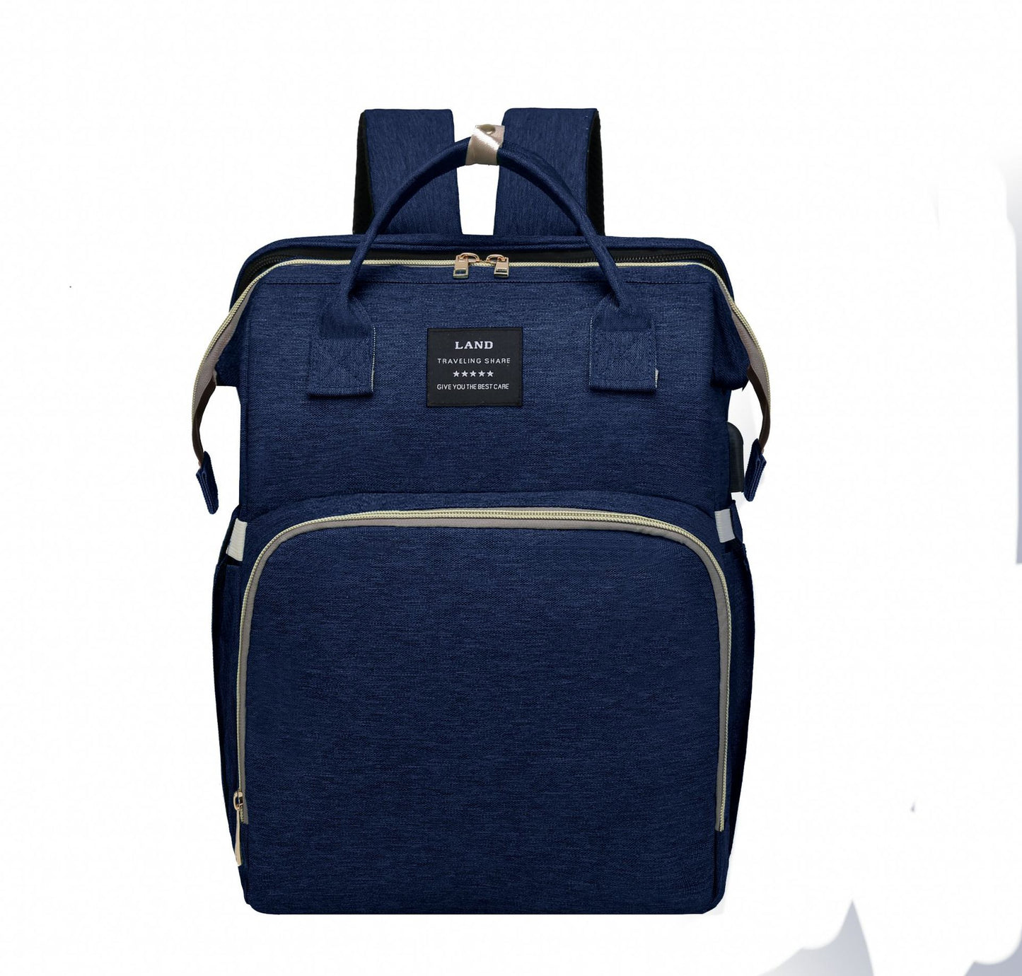 Dark blue backpack with a front zippered pocket and a top handle. Features adjustable straps and a small patch labeled "Land Traveling Share" on the front.