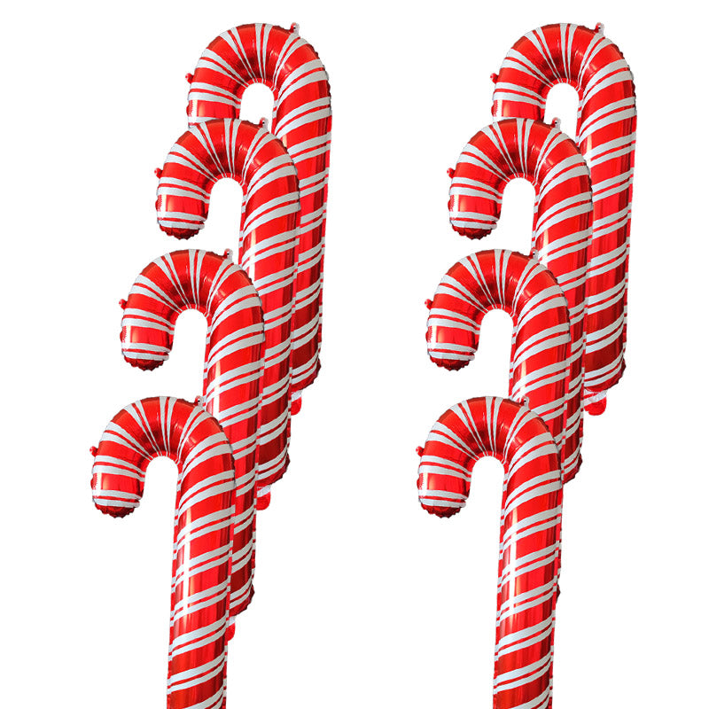 Red and white striped candy cane balloon decorations clustered together on a white background.