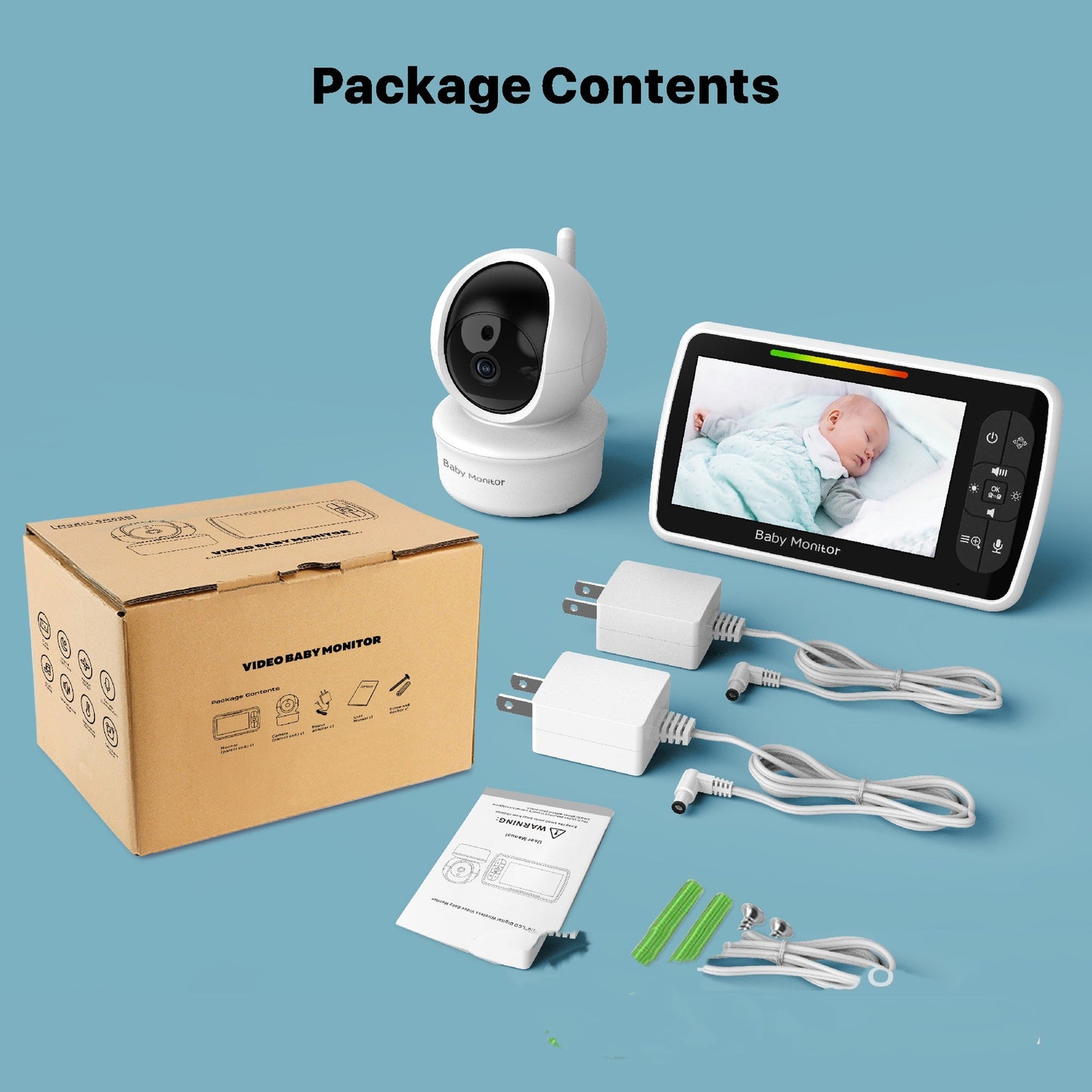 Baby monitor package showing a camera, monitor displaying a sleeping baby, two chargers, cables, a brown box, instruction manual, and mounting accessories on a blue background.