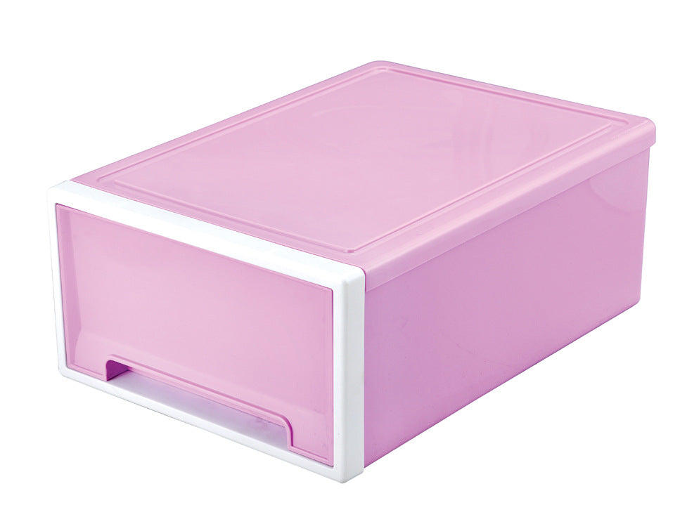 Pink plastic storage box with a white handle, featuring a rectangular shape and smooth edges. The front has a small, indented grip for easy drawer access.