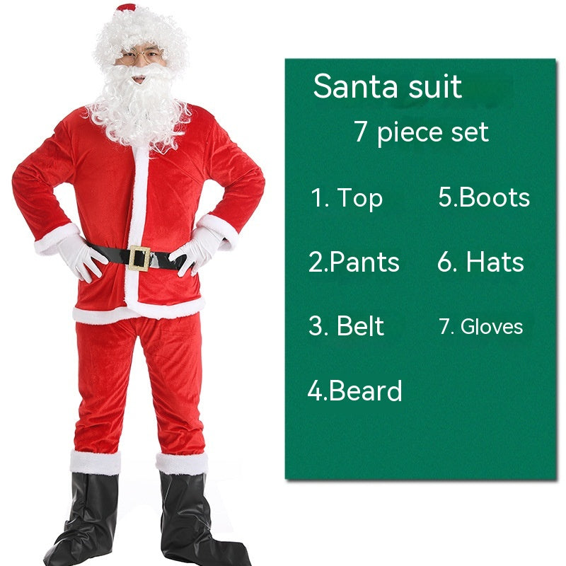 Santa Claus in a full red suit with white trim stands beside a green board listing a 7-piece Santa set: top, pants, belt, beard, boots, hat, and gloves.