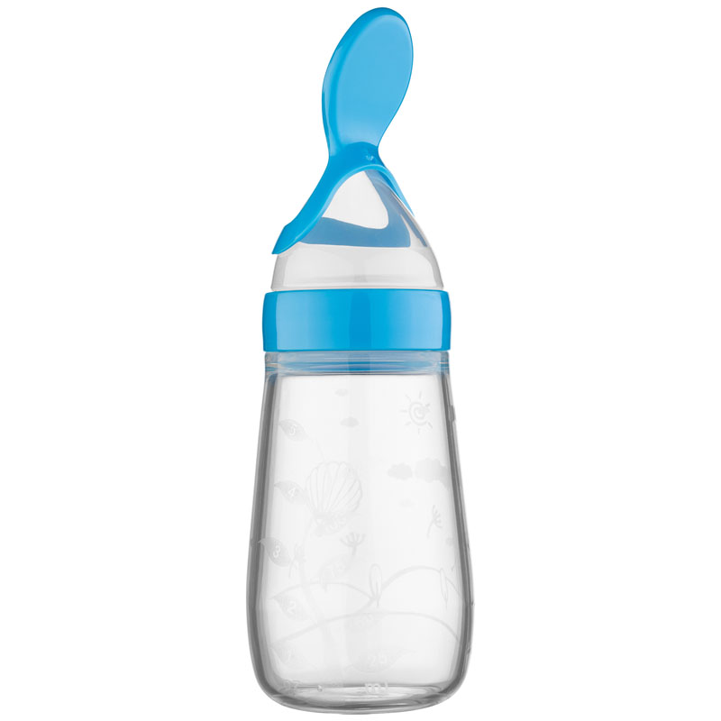 Clear baby bottle with a blue spoon lid, featuring engraved whimsical patterns of the sun, clouds, and a shell.
