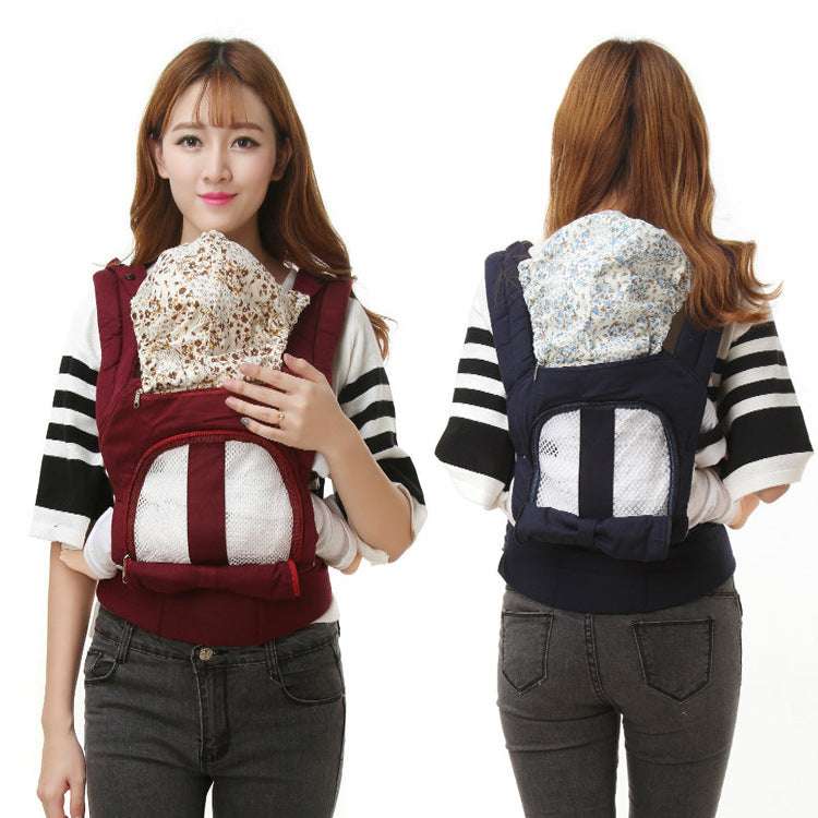 A woman with long hair is shown from the front and back, wearing a striped shirt and jeans. She carries a baby in a red front-facing carrier, and a blue carrier on her back.