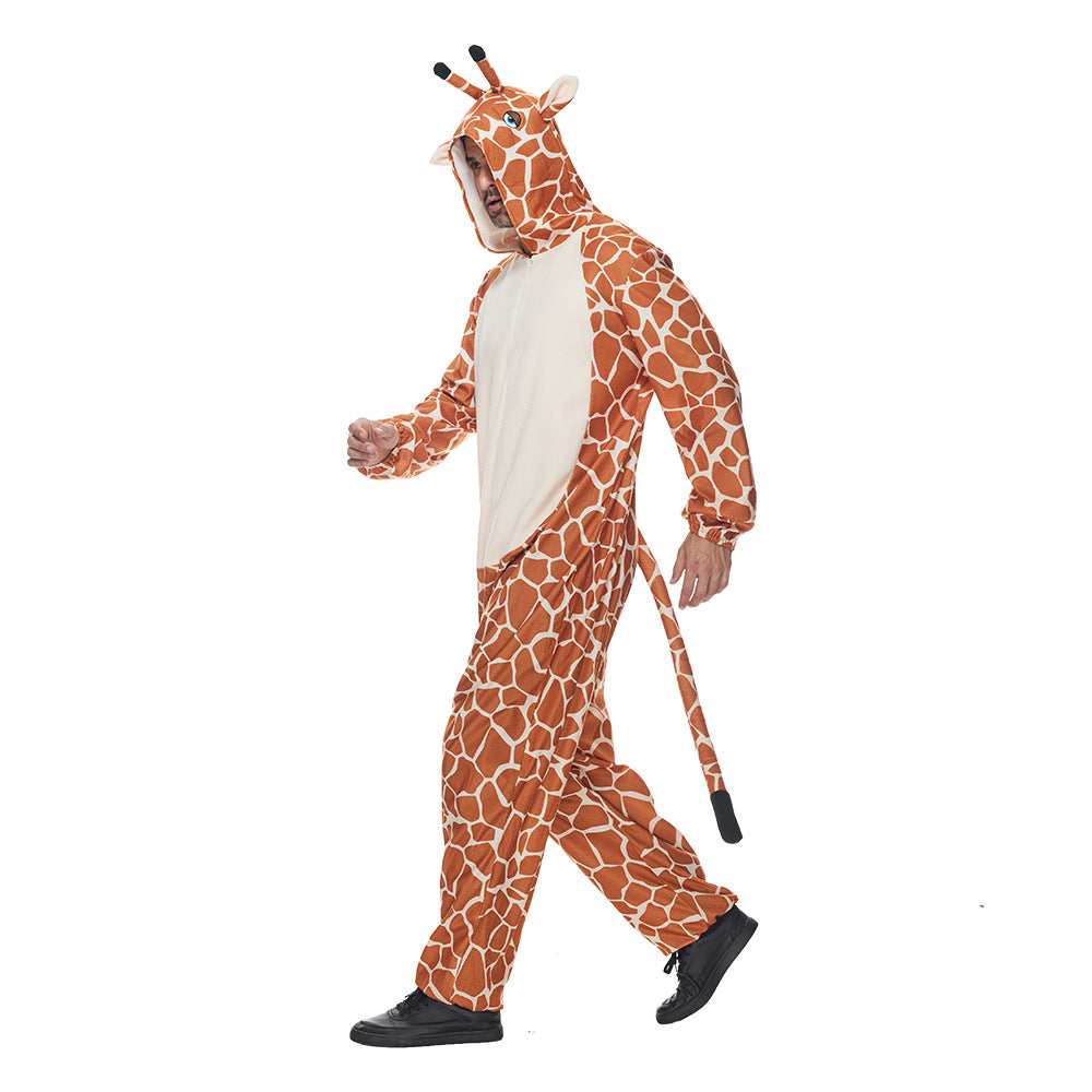 Person walking in a giraffe costume with orange and white spots, hood featuring ears and antennae, wearing black shoes. The costume includes a long tail.
