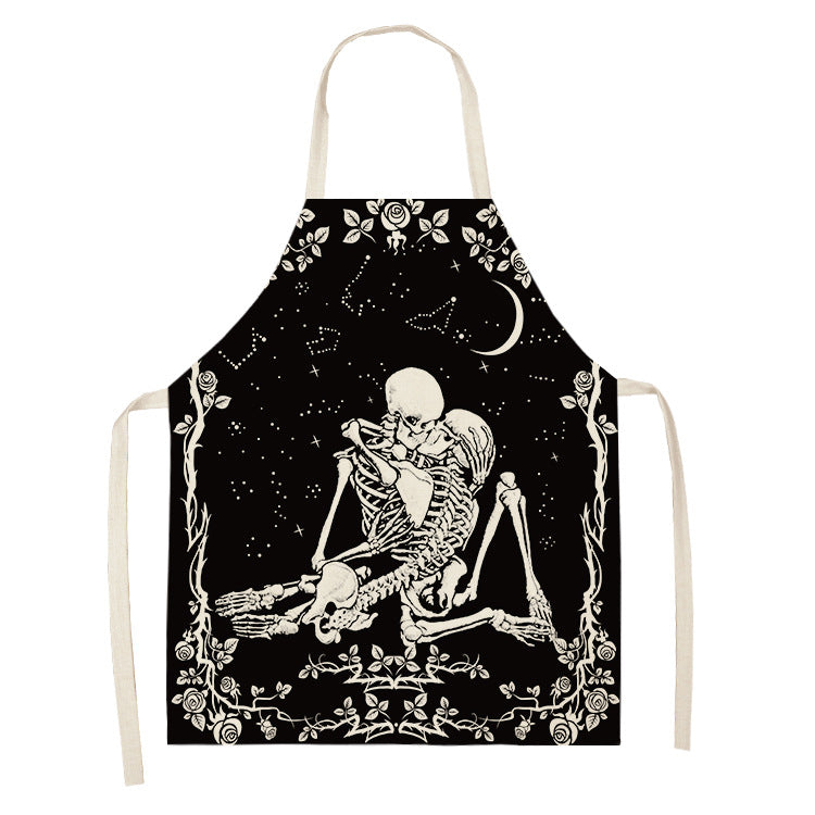 Apron featuring a black and white design of two skeletons embracing under a starry sky with a crescent moon, framed by floral patterns.
