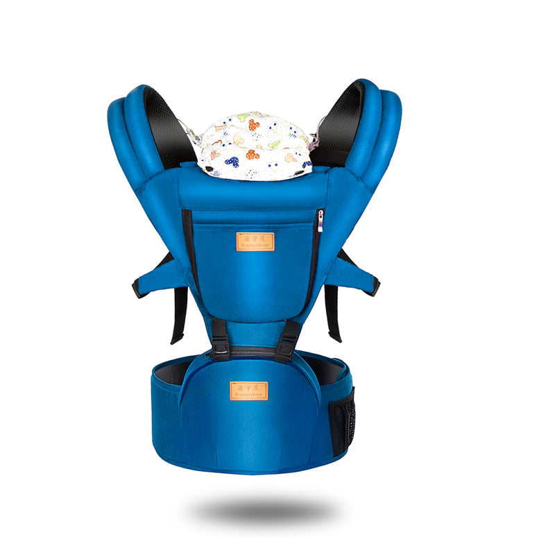 Blue baby carrier with padded shoulder straps, ergonomic seat, and a colorful patterned fabric insert. Features multiple buckles and a front pocket for convenience.