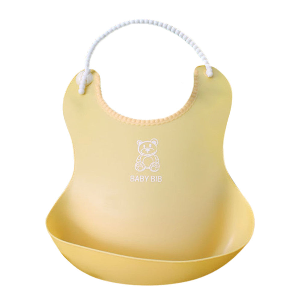 Yellow silicone baby bib with a pocket at the bottom for catching food. It features a cute bear illustration and the text "Baby Bib" on the front.