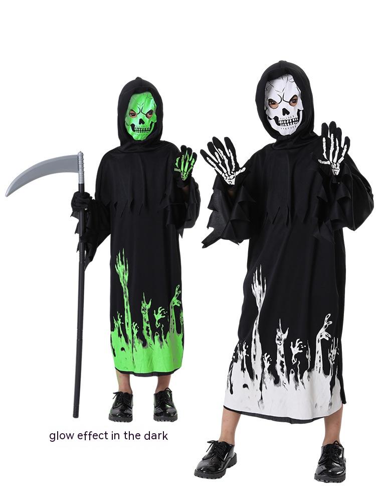 Two figures in black hooded robes and skeleton masks. One wears a green glow-in-the-dark mask and holds a scythe. Robes have reaching hands design; shoes are black.
