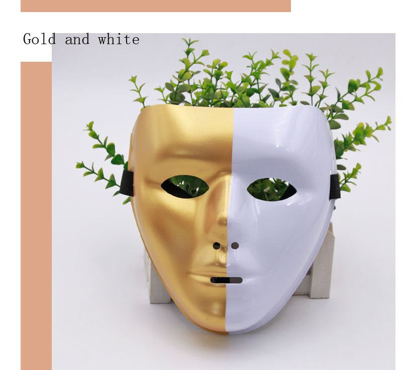 A half-gold, half-white face mask with plant foliage emerging from the top, set against a white background with text reading "Gold and white" in the top left corner.