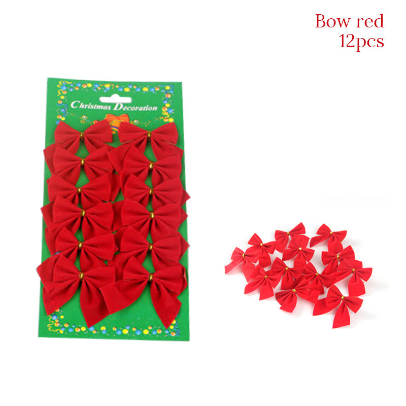 Package of 12 red decorative bows on a green card labeled "Christmas Decoration." Bows have golden centers, suitable for holiday adornments.