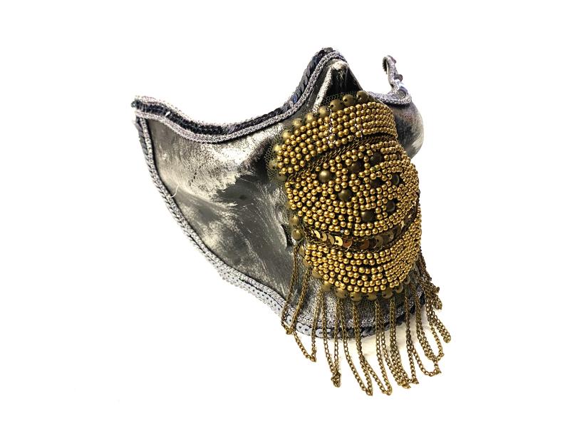 Silver masquerade mask adorned with intricate golden beadwork and cascading fringes, creating an ornate, luxurious appearance.