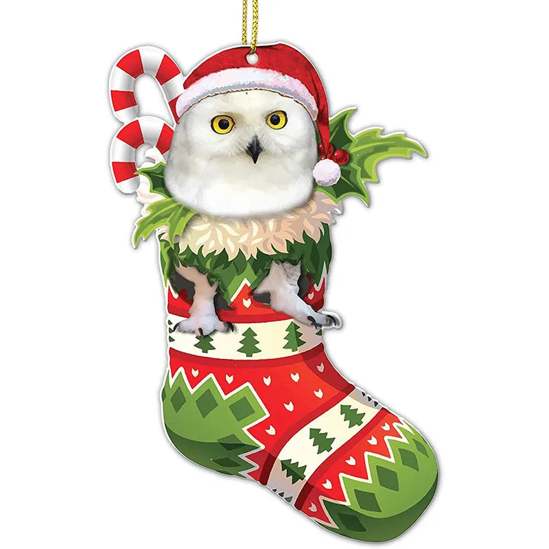 A white owl wearing a Santa hat sits inside a festive red and green Christmas stocking adorned with trees and snowflakes, complete with a candy cane and holly accents.