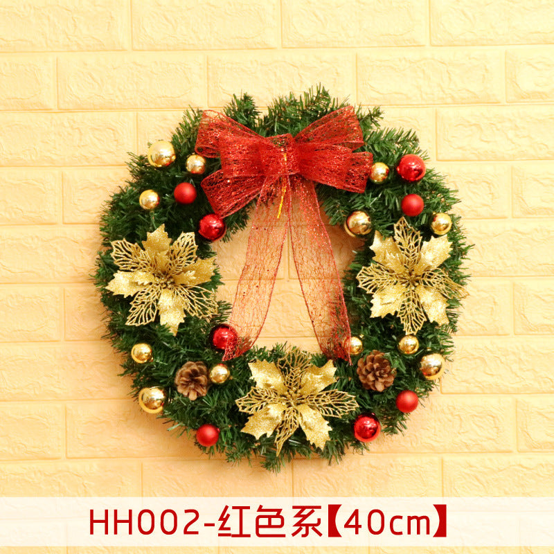 Festive wreath on a wall adorned with a red bow, gold and red baubles, golden flowers, and pine cones. The text "HH002-红色系【40cm】" is displayed below.