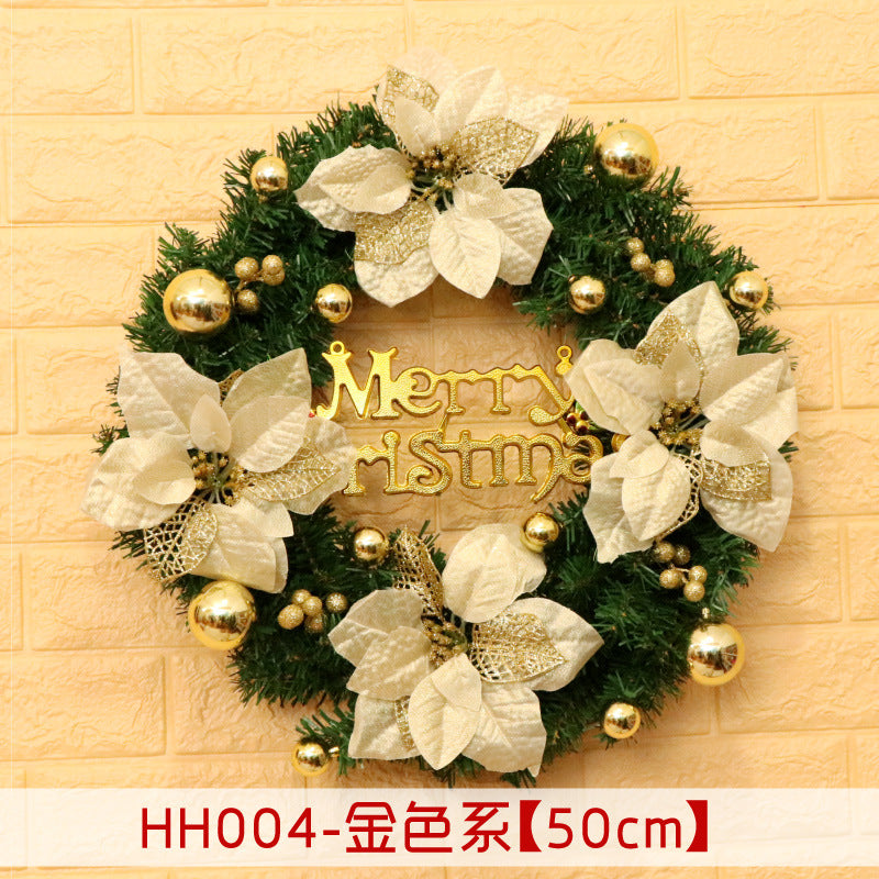 Christmas wreath with gold poinsettias, shiny ornaments, and a "Merry Christmas" sign on a textured cream wall. Text at the bottom reads “HH004-金色系【50cm】”.