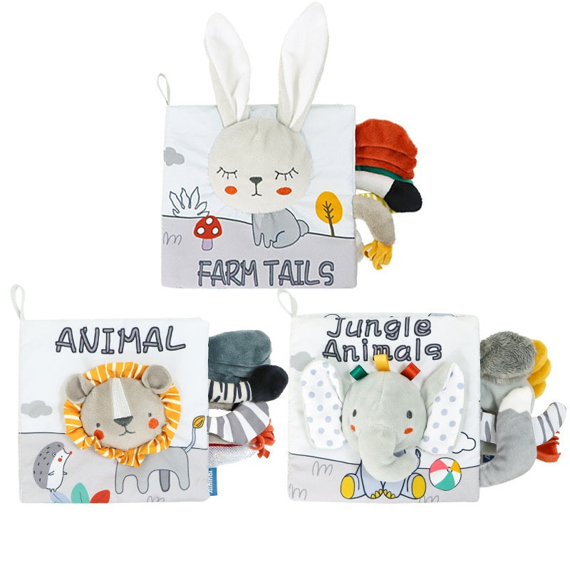 Three soft baby books featuring animal designs: a bunny on "Farm Tails," a lion on "Animal," and an elephant on "Jungle Animals," with various textured tails sticking out.