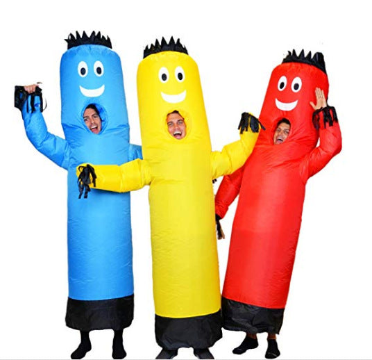 Three people in colorful inflatable tube costumes—blue, yellow, and red—pose cheerfully with arms raised. Each costume has a smiley face and black accents on top and bottom.