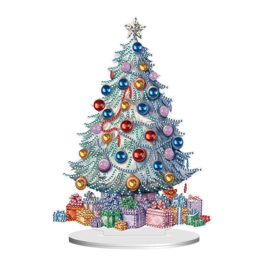 Festive Christmas tree adorned with colorful ornaments and beads, topped with a star. Wrapped gifts in various colors and patterns are placed at its base on a white surface.