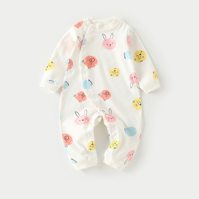 White baby onesie with colorful animal faces in pink, yellow, blue, and red, featuring smiling bears and rabbits. Made from soft fabric with snap buttons for easy dressing.
