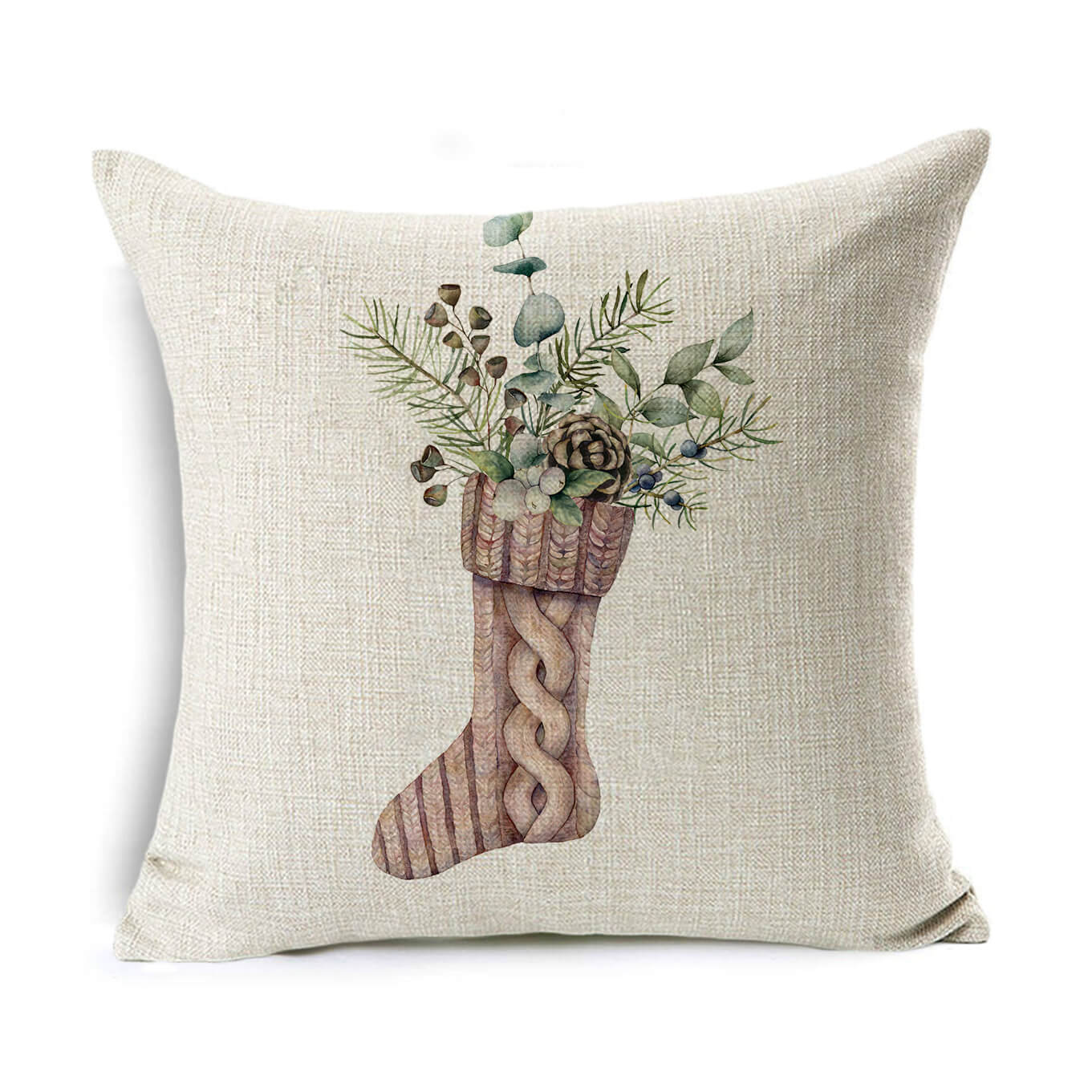 Beige pillow with printed design of a knitted stocking filled with fir branches, pinecones, and other greenery, on a textured background.