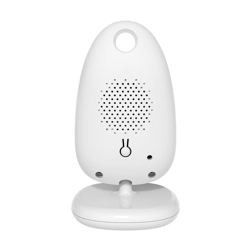 White, egg-shaped electronic device on a small base with a circular cutout at the top, perforated speaker grille, and simple indicator light on the front.