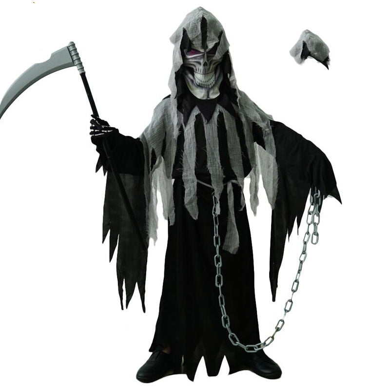 A person dressed as a Grim Reaper, wearing a tattered black and gray robe, holding a scythe. Chains hang from their waist, and the mask has a creepy skull design.