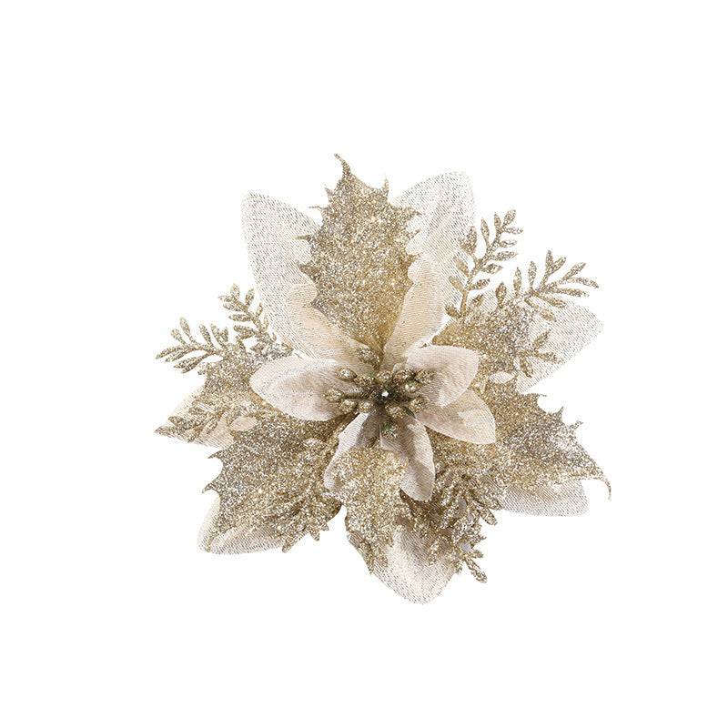 Elegant gold glitter poinsettia ornament with shimmering petals and detailed leaves, designed for festive decoration against a plain white background.