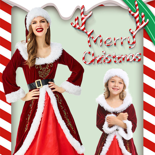 Two people wearing matching red and white Santa dresses with fluffy trim and Santa hats. "Merry Christmas" is written above them with candy cane stripes.
