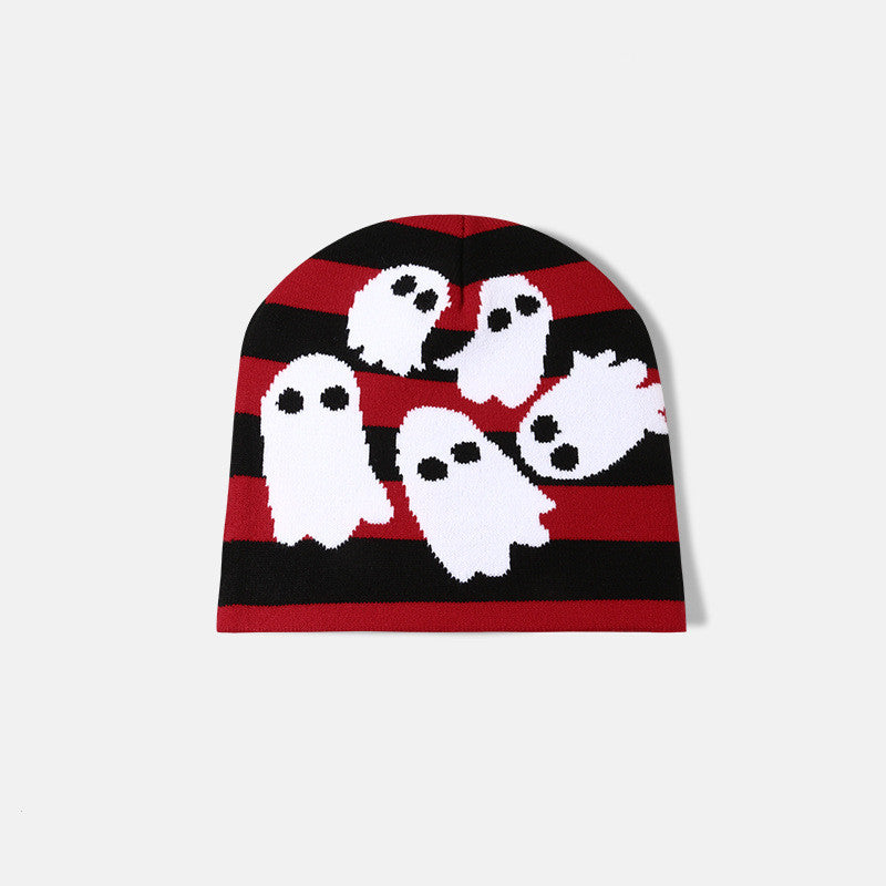 Red and black striped beanie with white ghosts featuring black eyes.