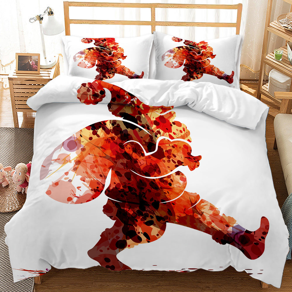Bedding set with vibrant red and orange abstract dancer silhouette print on duvet and pillows, on a wooden bed in a cozy room with decorative dolls and a photo on the side table.