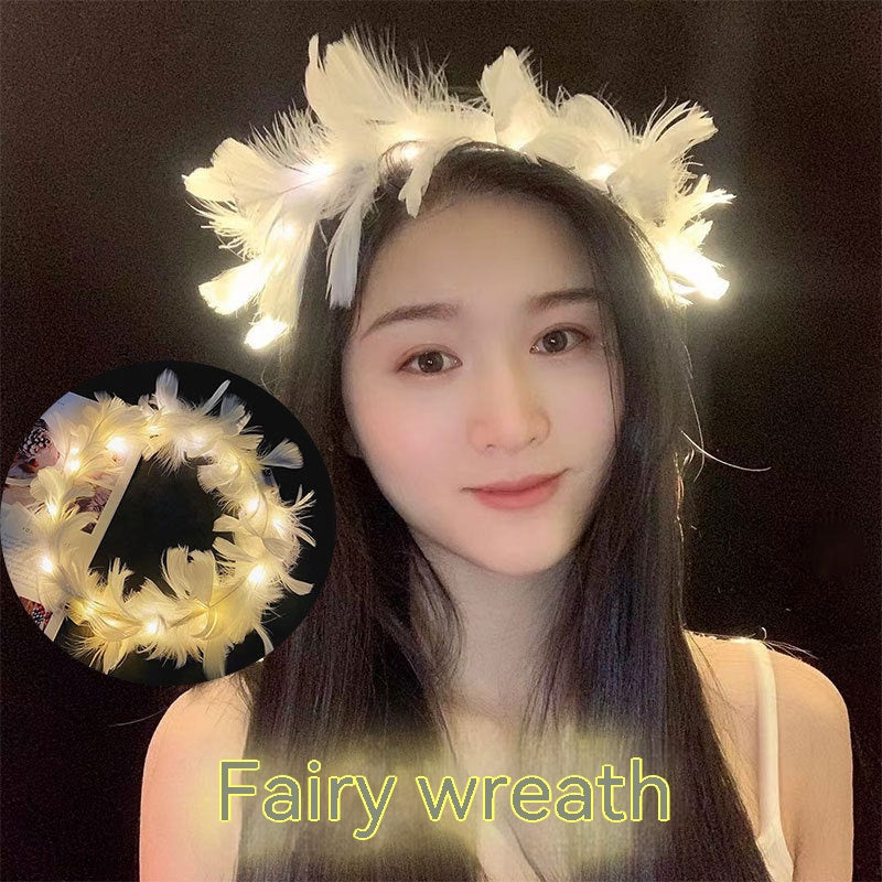 Young woman wearing a glowing fairy wreath of feathers and lights. Inset shows close-up of the wreath. Text overlay reads "Fairy wreath" in glowing letters.