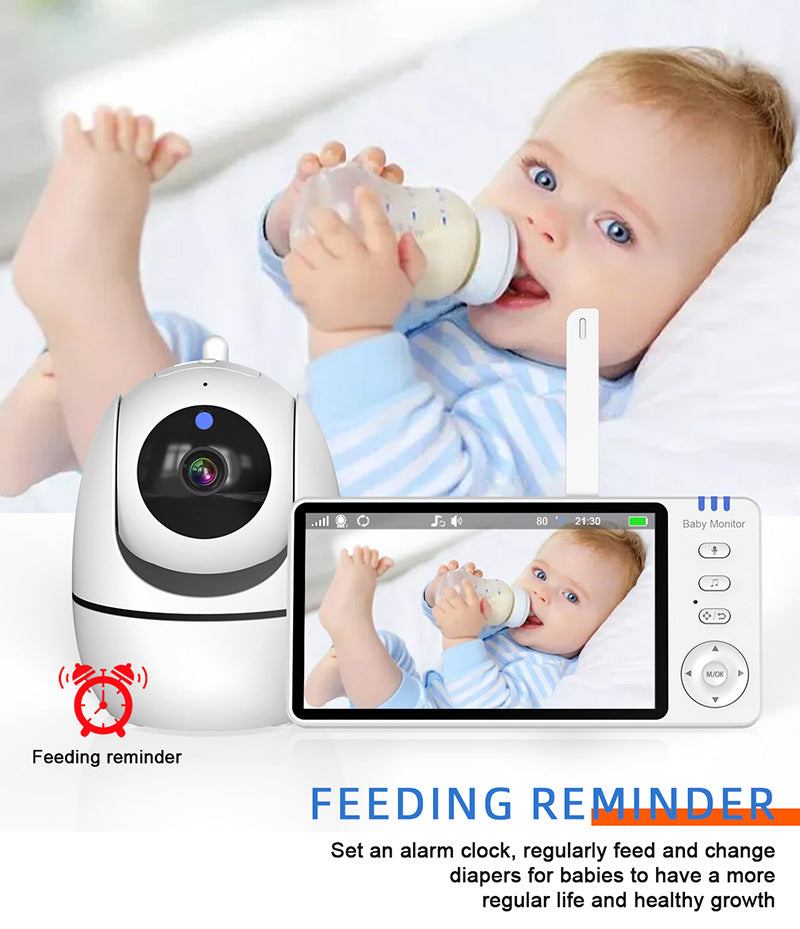 A baby drinks from a bottle on a screen, displayed by a baby monitor. Text reads "Feeding Reminder" with alarm clock icon. The monitor emphasizes regular feeding and diaper change.