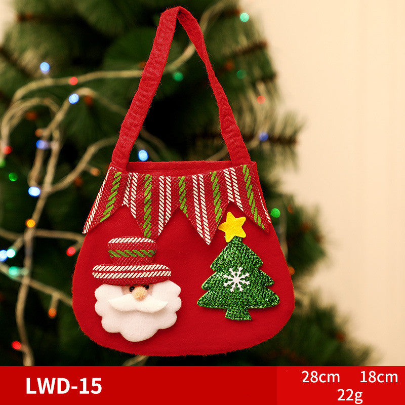 Red festive bag with Santa face and green Christmas tree decorations, hung on a Christmas tree with colorful lights. Dimensions: 28cm x 18cm. Weight: 22g.