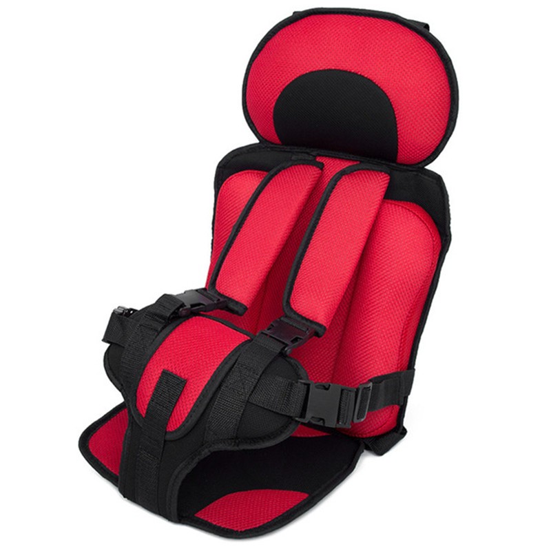 A red and black child car seat with padded cushions and safety straps, designed for comfort and security. The seat features adjustable harnesses and a headrest.