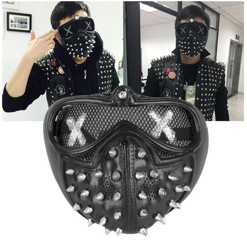 Person wearing a black mask with X eyes and spikes, paired with a studded black vest; close-up of the mask with metal spikes, mesh, and X design displayed below.