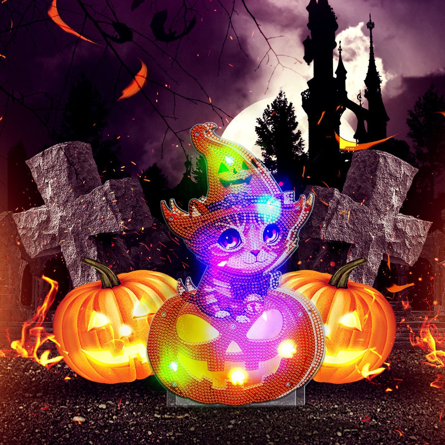 A sparkling cat in a witch hat sits atop a glowing jack-o'-lantern, surrounded by pumpkins and grave markers. A spooky castle and full moon create a Halloween scene in the background.